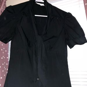 Trina Turk Black button down top with poofshoulder